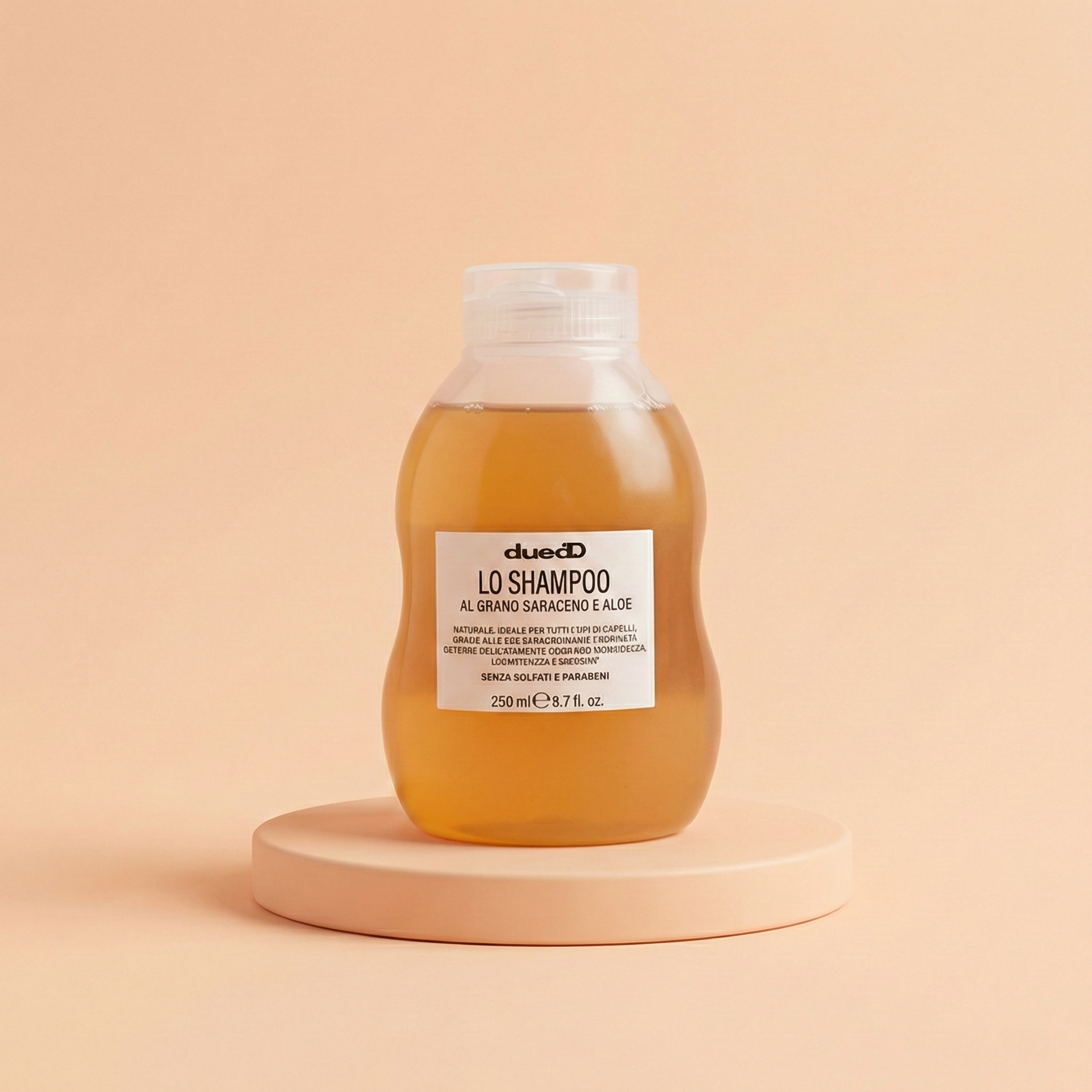 Flacone da 250ml di Shampoo al Grano Saraceno e Aloe DUEDD, formula naturale senza siliconi e solfati per capelli forti e luminosi